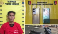 barang bukti motor dan dua ponsel hasil pencurian di Salon Armega Jorong Kabupaten Tanah Laut