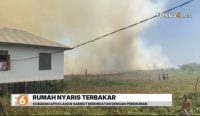 Karhutla di Pasayangan Martapura mendekati rumah warga. Petugas memadamkan api selama hampir satu jam di lahan gambut.