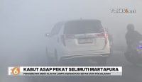 Kabut asap pekat menyelimuti Martapura, Kabupaten Banjar. Jarak pandang pengendara turun hingga satu meter di sejumlah titik.